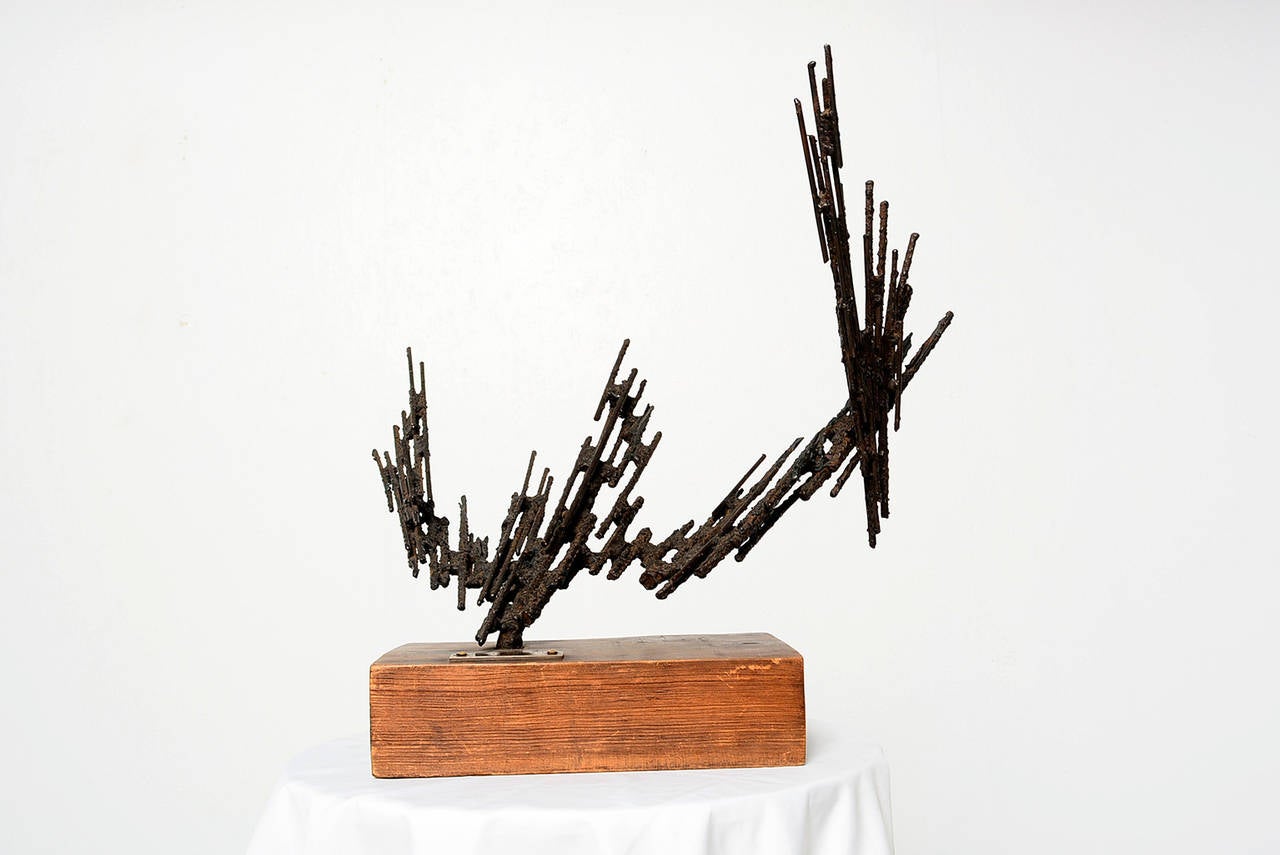 For your consideration a Brutalist sculpture by Stanyo Kaminsky. 
Bronze label dated 1977. Stamped with makers initials underneath the wood base.