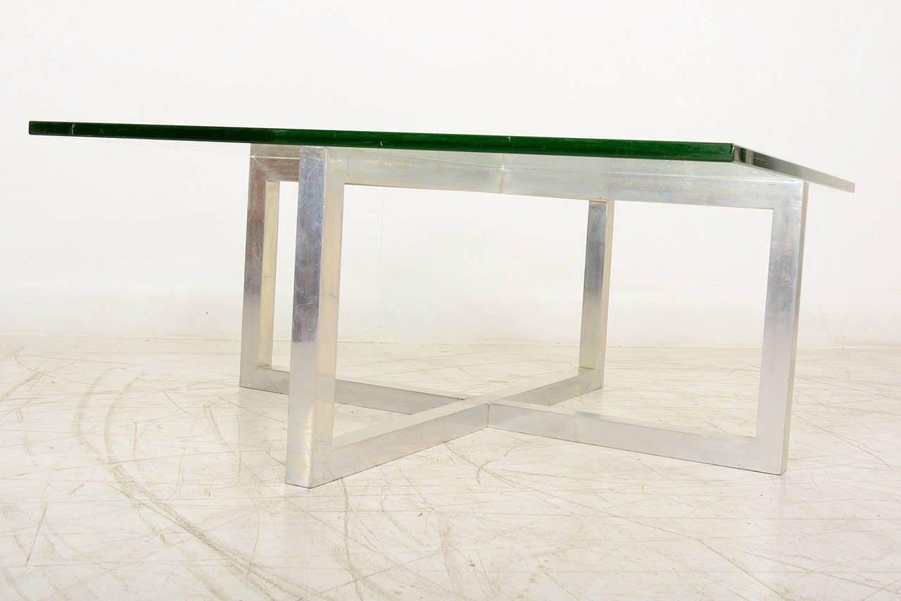 For your consideration a vintage coffee table after Paul Mayen.

Aluminum 
