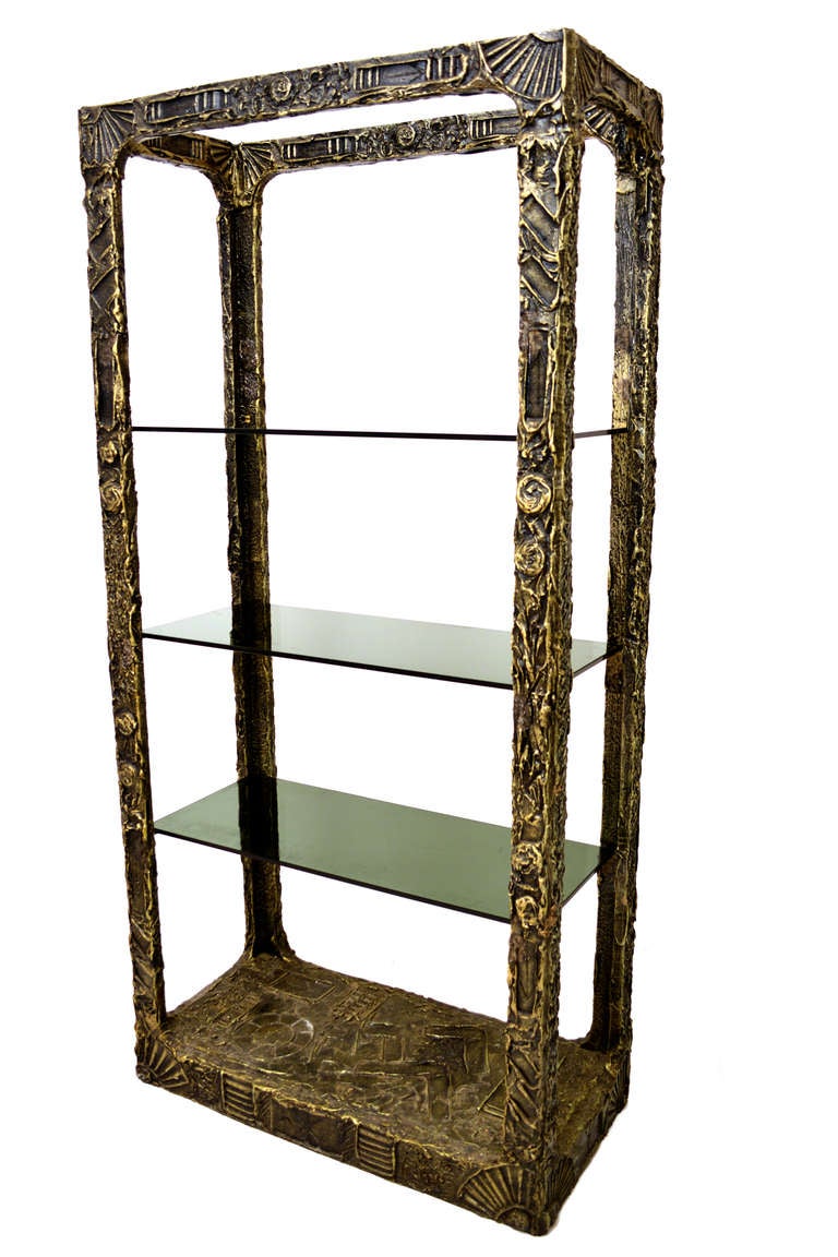 For your consideration an etagere by Adrian Persall for Craft & associates. In the manner of brutalist work by Paul Evans. 
The smoke glass shelves can be removed for safe and easy shipping. 
Original verdi-gris patina, Firm and sturdy. 