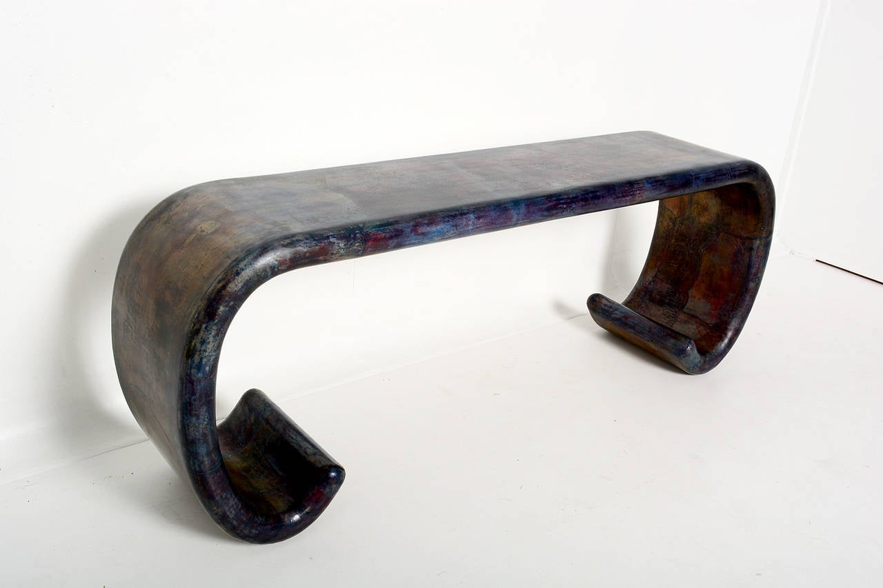 For your consideration a vintage console table with sculptural shape.
Custom Brutalist finish showing a range of color from blue to red and natural skin tones.