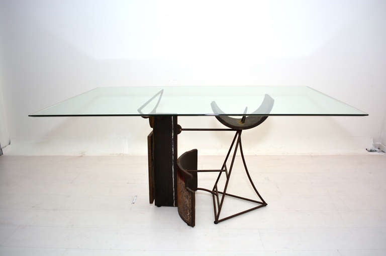 For your consideration a vintage desk. The base is a metal sculpture  signed y "Jaime Artigas". Beautiful abstract shape with wonderful patina. There are two section attached by screws.  Glass top is very clean.
60