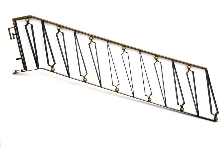 For your consideration a handrail produced in Mexico City circa 1950s by Talleres Chacon.  

Executed in forged iron and brass accents. 

Talleres Chacon produced custom orders of  forged iron and brass. Working with the best designers of the