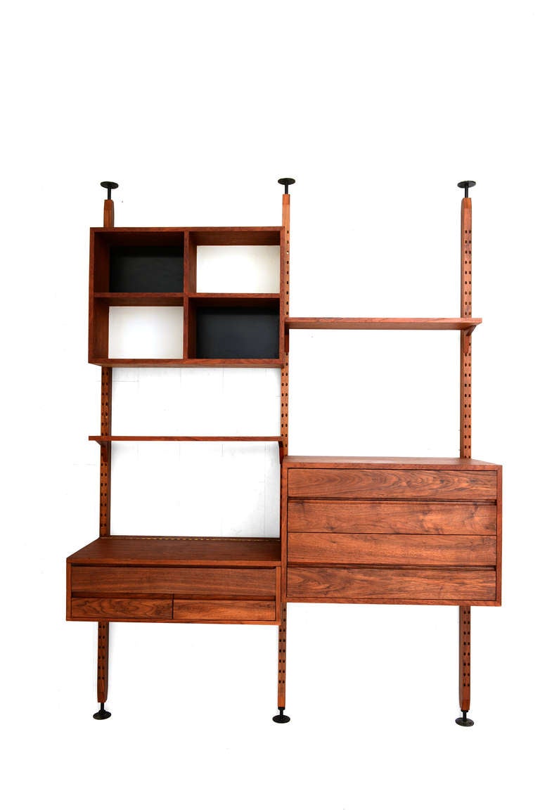 For your consideration and danish modern wall unit by CADO. 

Standing unit with three (3) uprights to form two panels. 
The tension poll upright are 88 3/4