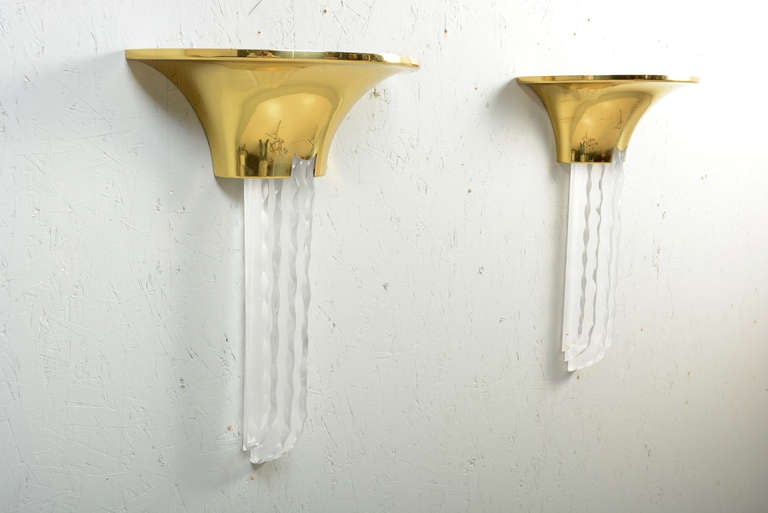 For your consideration a pair of wall sconces in brass and Lucite by Karl Springer.