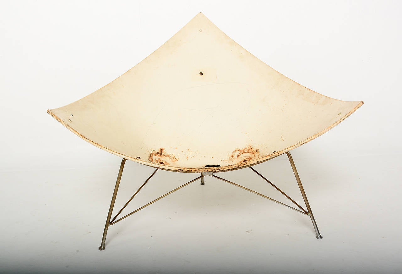 For your consideration a pair of coconut chairs designed by George Nelson.
First edition in metal. Later they were produced in fiberglass. 
Chairs are in the original vintage condition with original patina.
There are no cushions available. Chairs