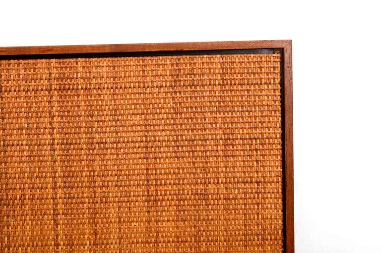 A twin size headboard designed by Richard Schultz for Knoll. 

Walnut frame with cane on front. 

