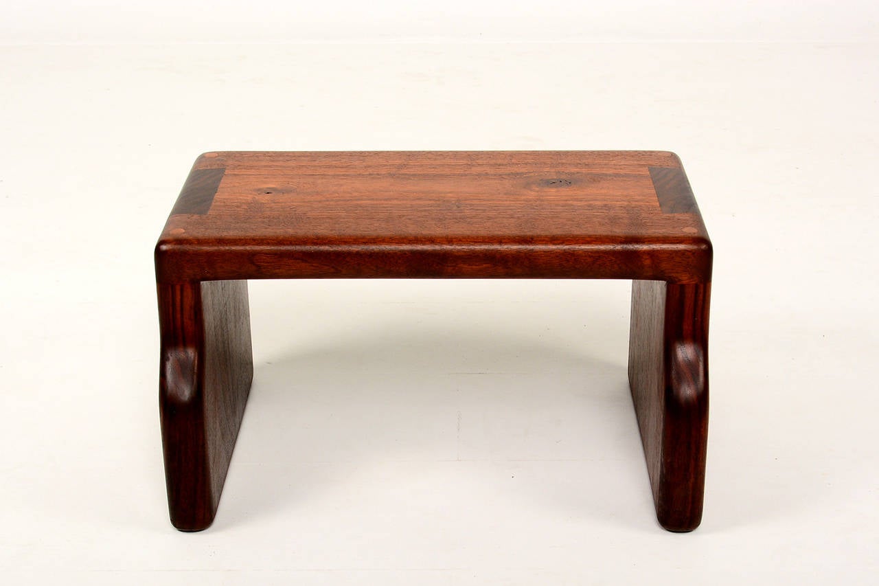 For your consideration a vintage stool made of solid walnut wood. Beautiful decorative piece.

Constructed with dove tail joints and smooth round corners. Firm and sturdy.
This item is excellent and it is ready to go .

There is no signature