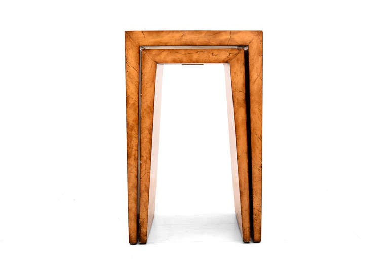 Set of two nesting tables by Theodore Alexander. 

Solid wood with exotic veneer. 

Label from the maker underneath. 

Dimensions 14