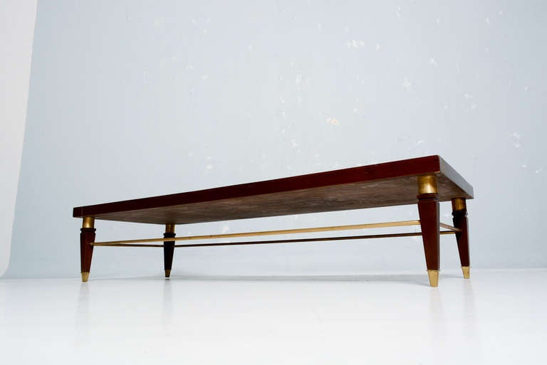 For your consideration: Neoclassical Mahogany & Brass coffee table, Art deco period by Robert & Mito Block.
Clean modern lines with brass ornamentation.
Great  vintage condition. Restored. Brass has some vintage patina. 
12.5 in.Hx5 ft. 3 in.Wx23.63