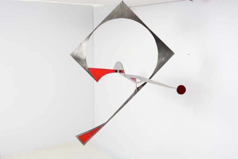For your consideration a hanging sculpture constructed with solid stainless steel. Some areas painted in red color. Steel cable (36