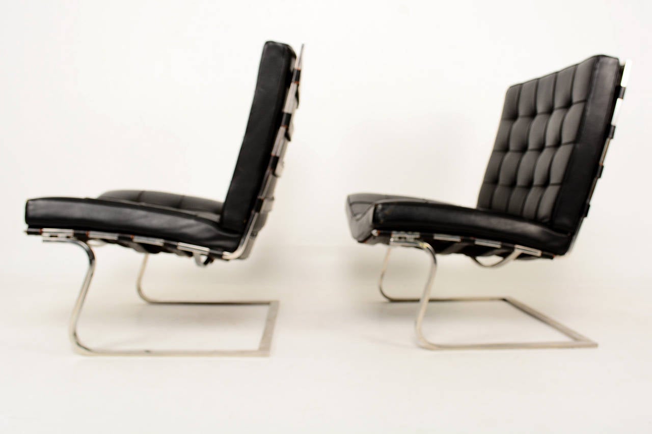 For your consideration a pair of Tugendhat lounge chairs designed by Mies van der Rohe, produced 7/15/1966 by Knoll.

Original vintage condition. Stainless steel frame with original cushions in black and labels underneath the chairs.