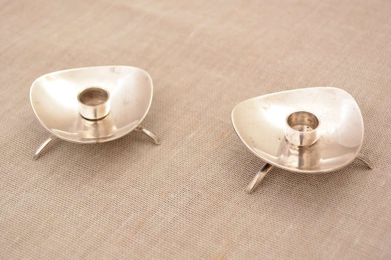 For your consideration a pair of silver plated candle holders by COHR ATLA Denmark. Tripod base with beautiful sculptural shape.