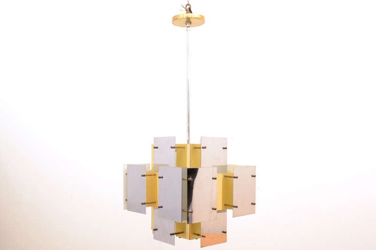 Modernist chandelier by Robert Sonneman. Original chrome-plated and brass plated panels with brass hardware. 

Rewired.


