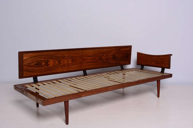 For your consideration a sofa and love seat set with corner table in  Brazilian Rosewood . Mounted in peg legs. Sculptural arm rest and beautiful with beautiful grain showing the beauty of the wood. 

Elastic fargas straps.

Long sofa 78