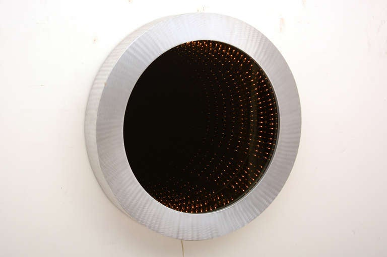 For you consideration the infinity mirror.

Covered with brushed aluminum.