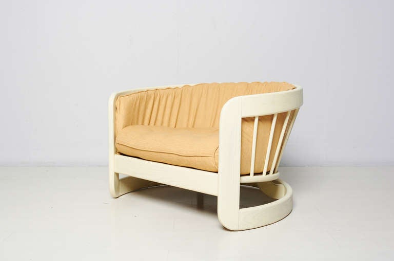 For your consideration an off-white lacquer wood lounge chair in the style of Milo Baughman.