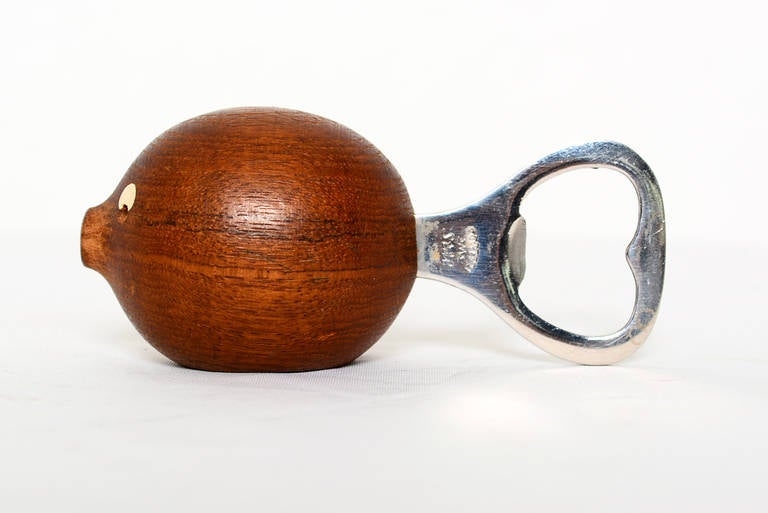 For your consideration a vintage bottle opener hand made in Denmark for GEMATEX. Sculptural solid teak wood with chrome plated bottle opener as the the fish tale.