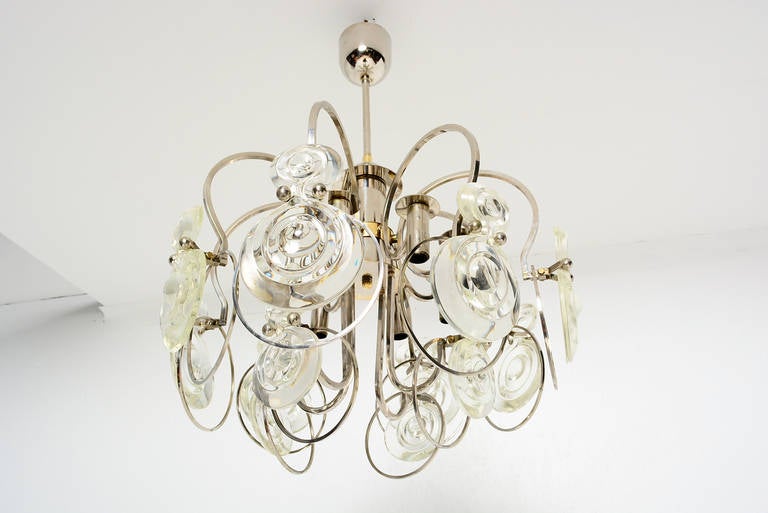 For you consideration an Italian chandelier in the style of Sciolari. 
Nickel plated with some brass accent pieces and custom-made, handblown glass diffusers with optical design. 

High quality craftsmanship. Unmarked.

Requires eight E-14