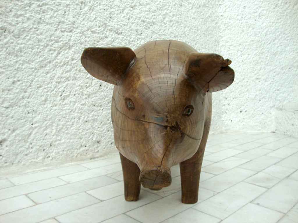 For your consideration a decorative sculpture or stool of a pig. Hand-carved of a large wood trunk. 

Beautiful attention to detail. It almost looks real. Great collectible one of kind item. 

Unsigned.