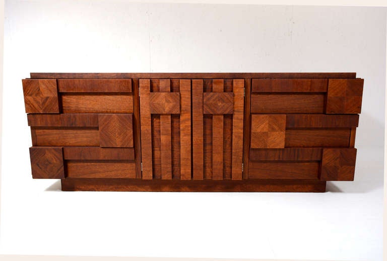 For your consideration a triple dresser by LANE.

Beautiful patchwork design with walnut veneer.