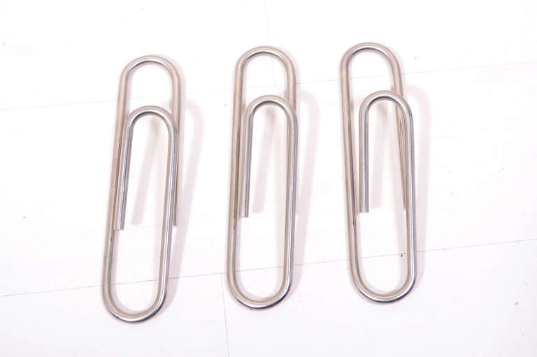 For you consideration a set of three oversize paper clips for a wall sculpture.