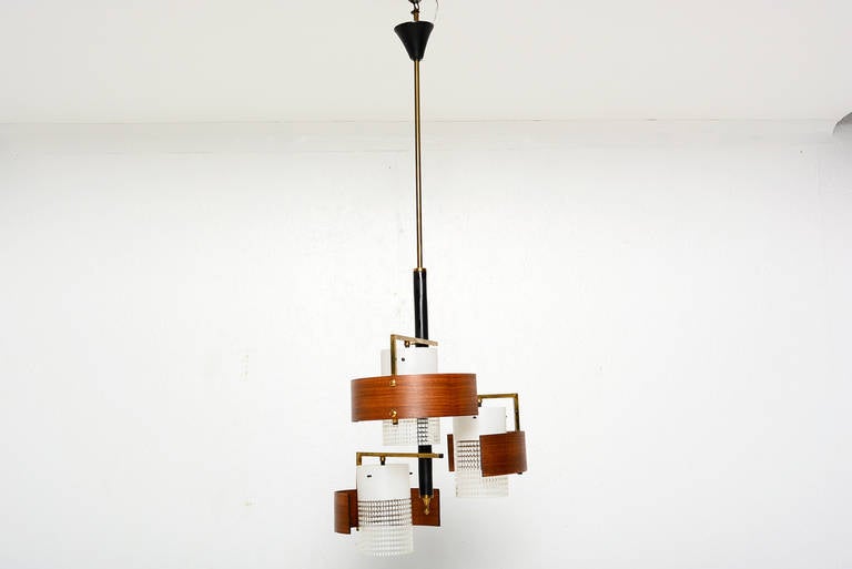 For your consideration a vintage italian chandelier with glass and bent teak plywood diffusers. 

Required three E14 bulbs.