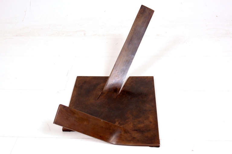 Stamped on the sculpture B.H.I. 3.81 (March 1981) 1.10 (1 of 10).

Patinated bronze 
the bent angles are not random. The sculpture can be standing in one side resting in one of the corners of the bent bar and keep a 90 degree angle. 

The