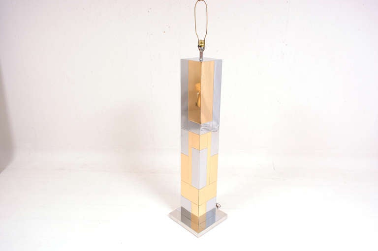 For your consideration a vintage floor lamp by Paul Evans, Cityscape series. 

Chrome-plated with brass-plated tiles. Unsigned. 

Shade not included in the sale, prop only.