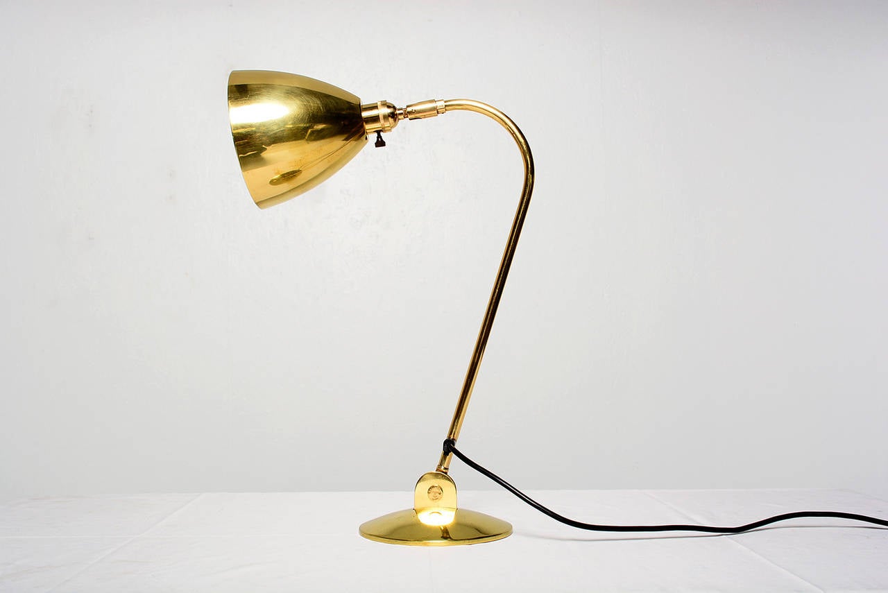A beautiful and one of a kind brass desk lamp fully adjustable. 

The top hardware has the stamp from OMI. Excellent working condition. Ready to go.
Brass is very clean.
Dimensions: 21 in.Hx7 in.Wx14 in.D
