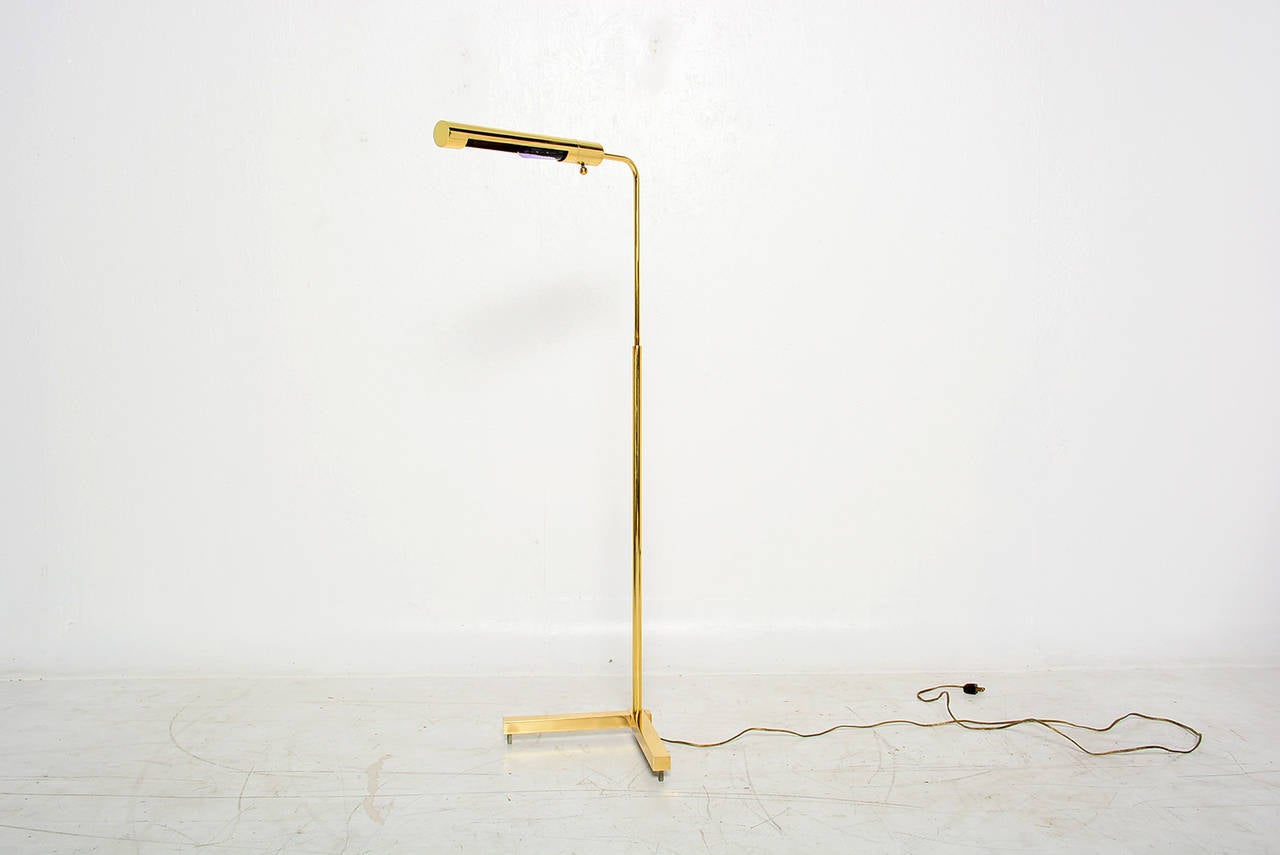 For your consideration a brass lamp made by Casella. 
Adjustable height with long cylinder. 

In perfect working condition.