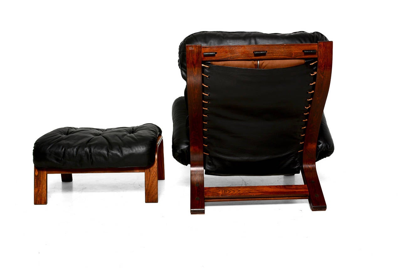 Scandinavian Lounge Chair and Ottoman in Rosewood and Black Leather 1