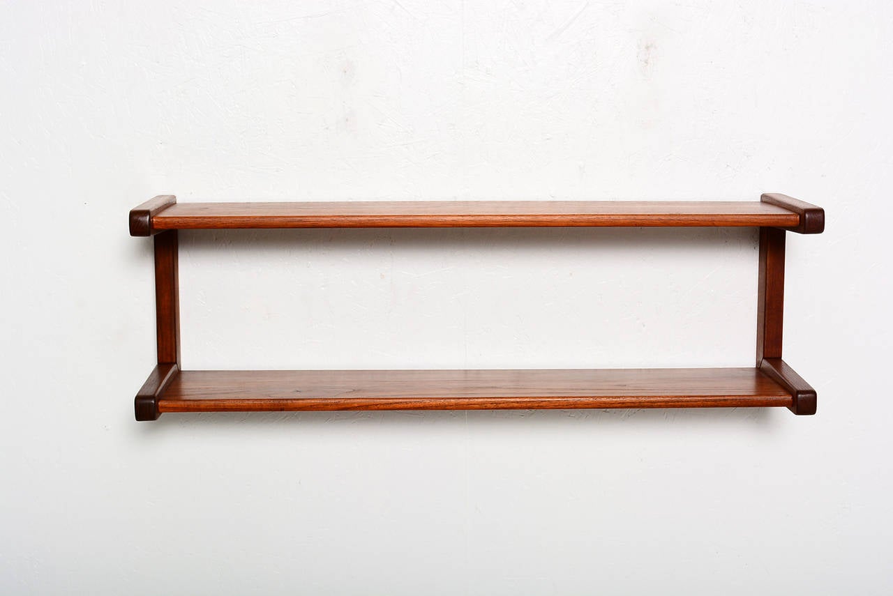 For your consideration a vintage danish modern teak shelves system.
Easy to install.  Unmarked.