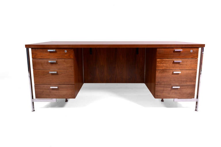 For your consideration a mid-century modern walnut desk.

Stamped 