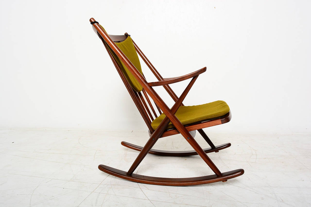 For your consideration a teak rocker designed by Frank Reenskaug for BRAMIN.
Original upholstery in green sage color.