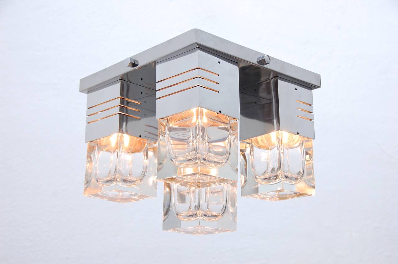 Cubic flush mount fixture attributed to Gaetano Sciolari in polished lacquered aluminum and pressed crystal.