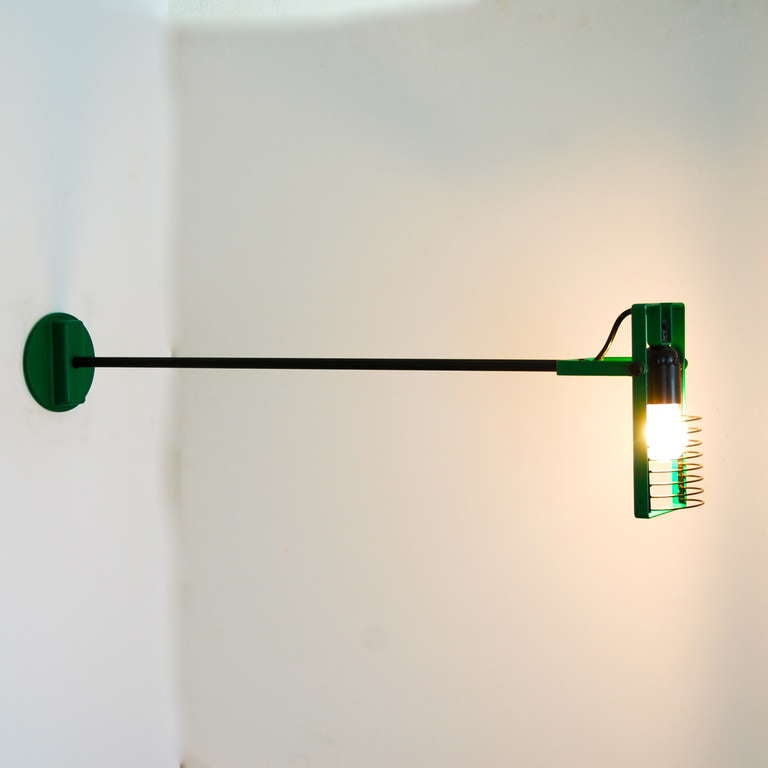 A rare and beautiful Sintesi Task Lamp, having a two-section rod, which can be used with two different lengths. The shade is fully directional. Ernesto Gismondi, an Italian designer, designed this light  in the 1970s for Artemide.  