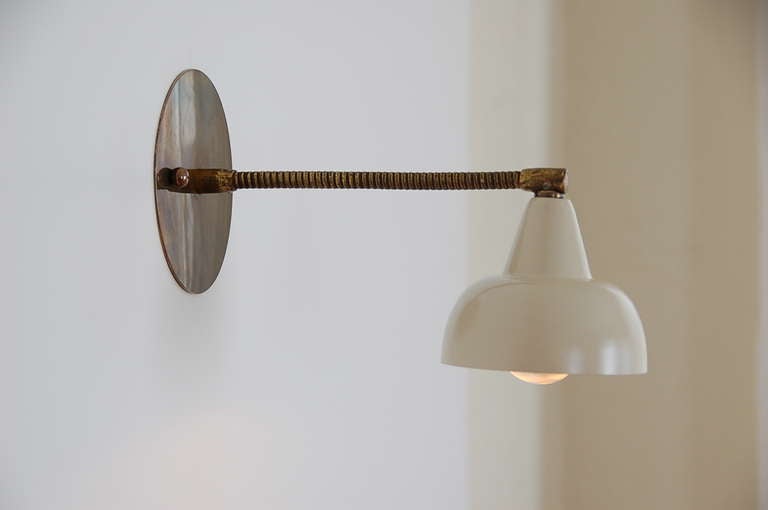 Petite Italian Wall Sconce from the 1950s. Ideal to illuminate wall art or small area.