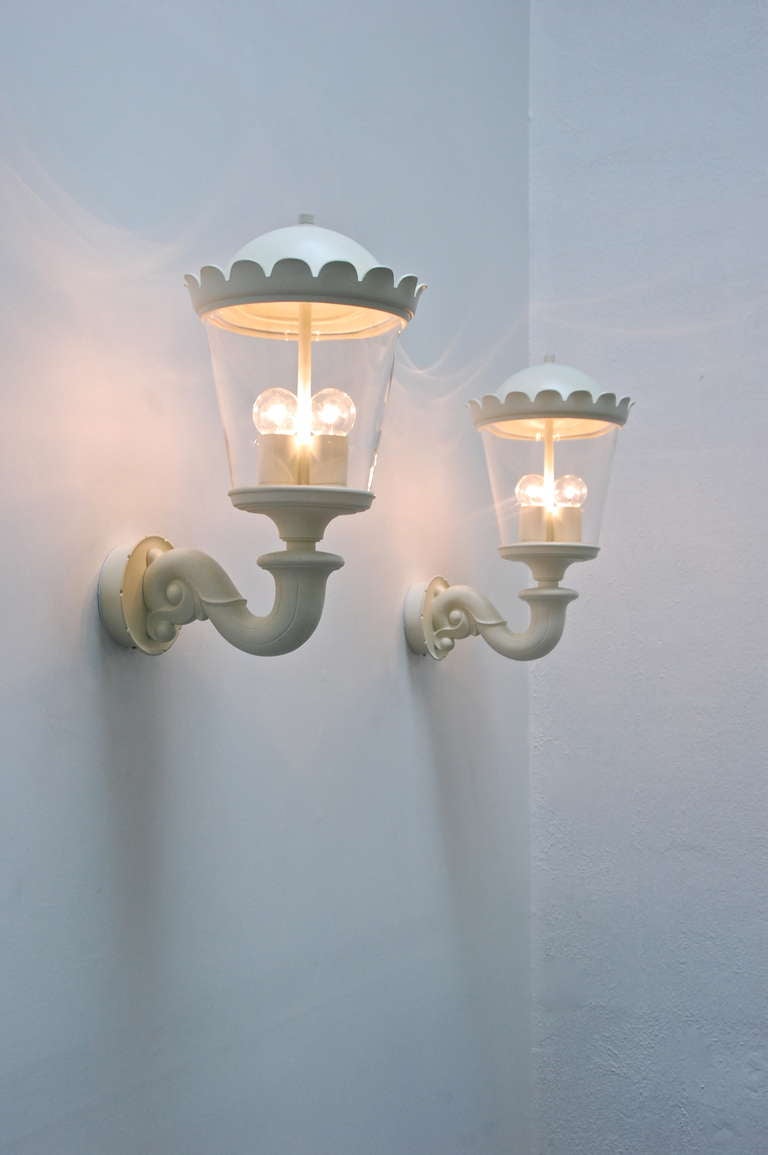 A Mid-Century take on a classic exterior lantern by German lighting manufacturer Bega. There is only 1 left out of 11 that were available with original glass. These sconces are of a special character. A very modern look coupled with a traditional