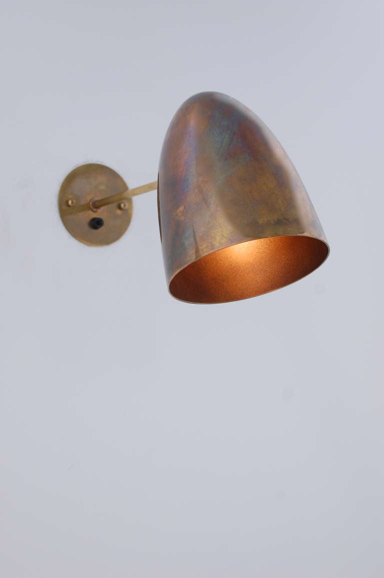 Directional brass sconces with a rich patinated finish. Shades rotate 360 degrees and up and down.

Shade Height: 8”
Shade Width: 6”