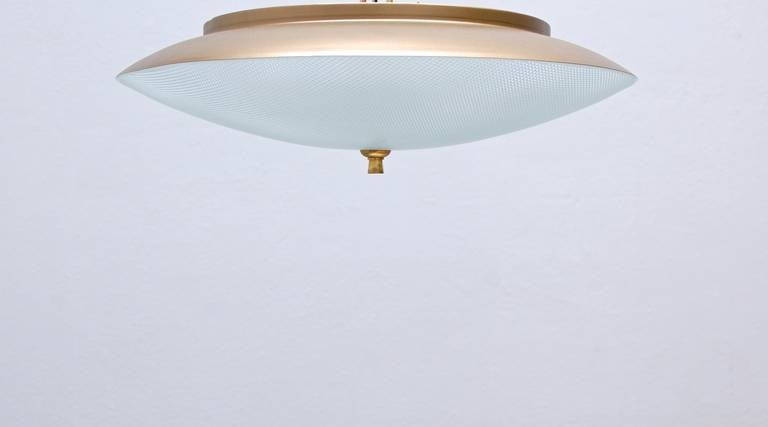 Elegant flush mount light by Esperia of Italy. Nicely wide and shallow with a pressed glass and crystal diffuser.