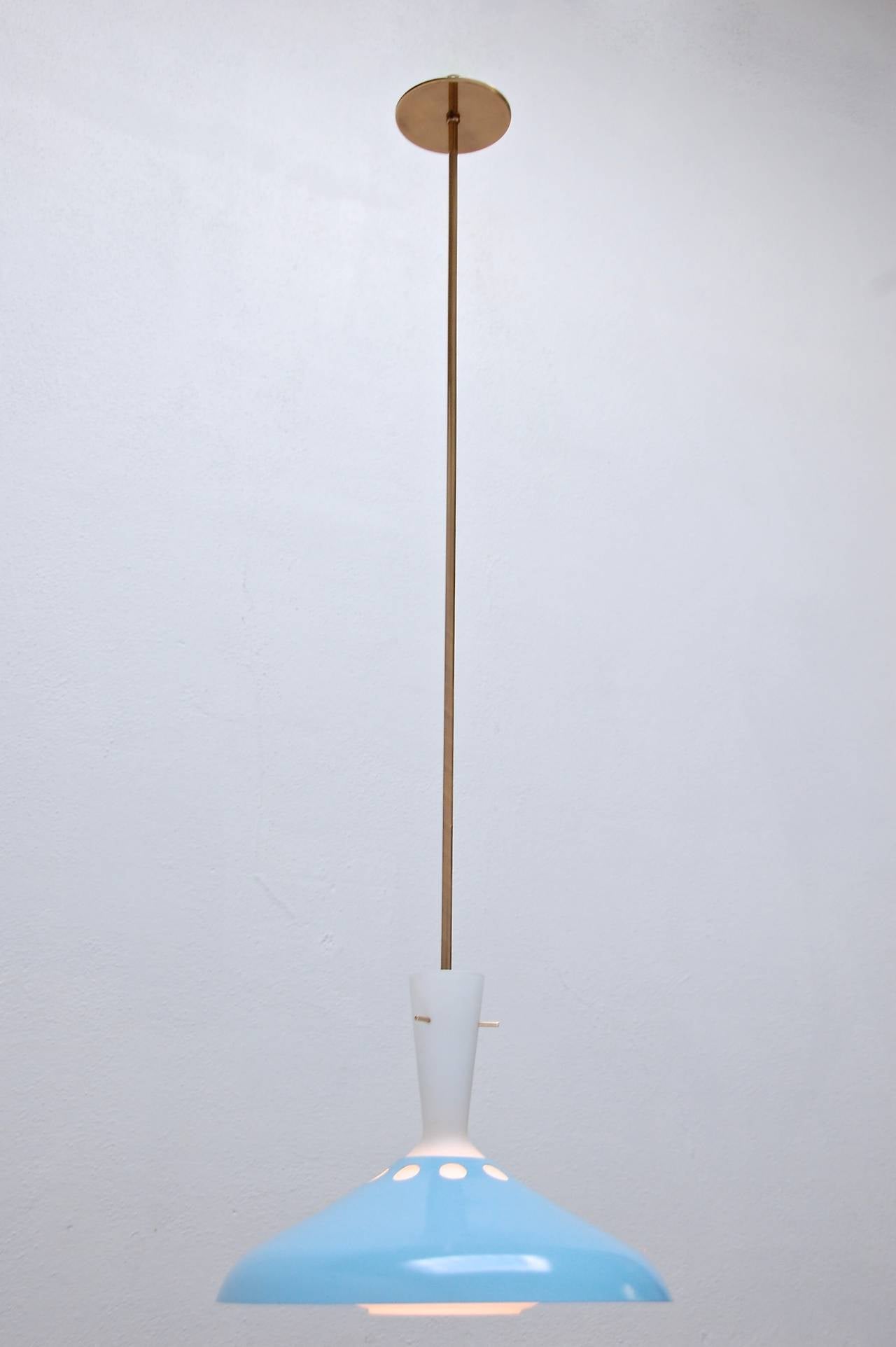 Delightful 1950s two-tone pendant light from Italy.

Current drop of 44” can be modified upon request.