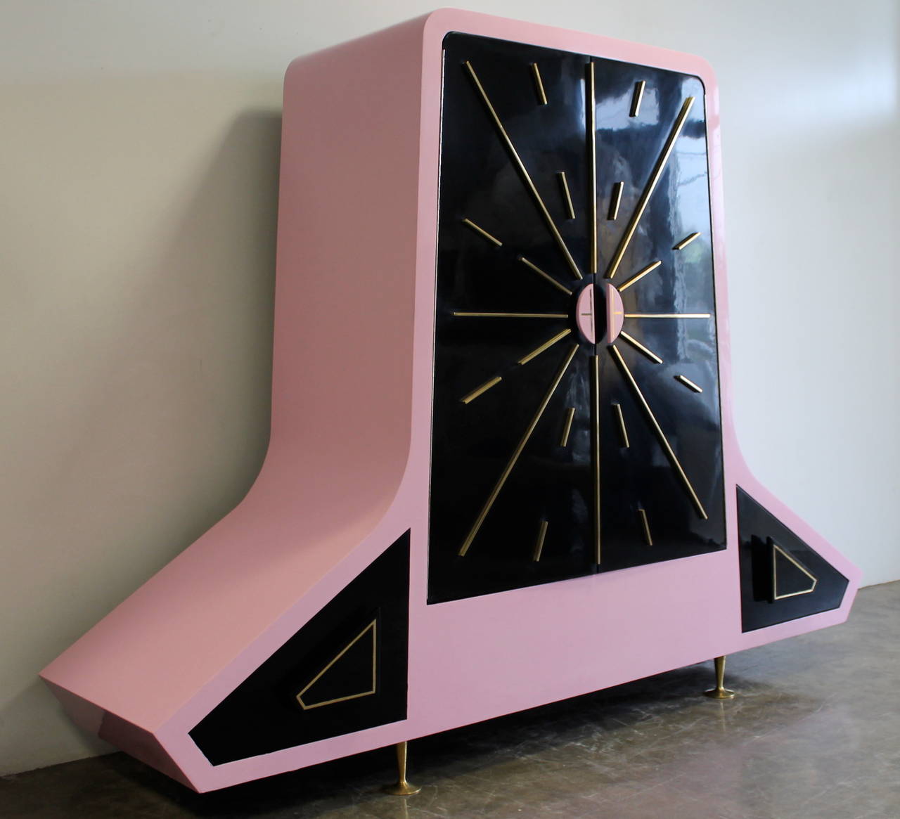 Unusual whimsical pink and black lacquered stardust armoire
by Frank Kyle, Mexico City, circa 1950s.
Beautiful brass accents and oversized Trompet Sabots.