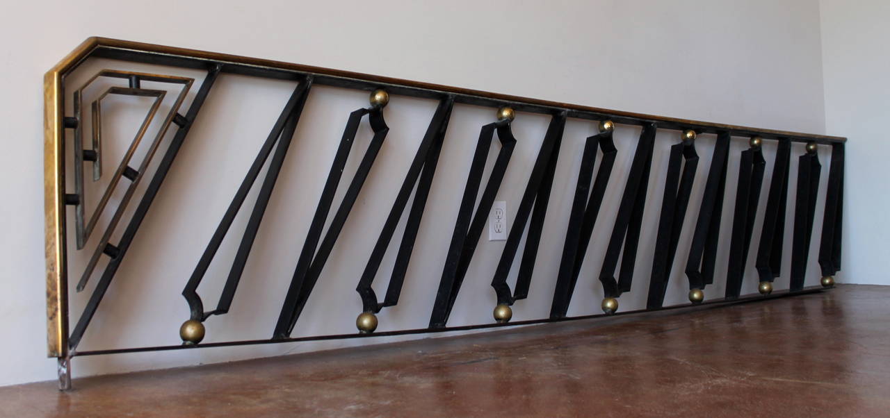 Stunning handrail designed by Arturo Pani.
Executed in forged iron and brass accents in the workshop or studio 