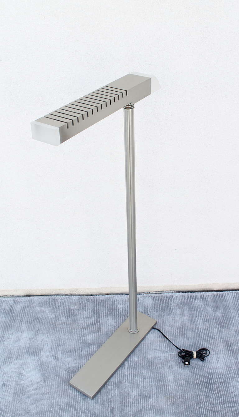 1980's Low Floor/Reading  Lamp in Brushed Metal and Acrylic 
A really nice modern 80's version of the Cedric Hartman Lamp.