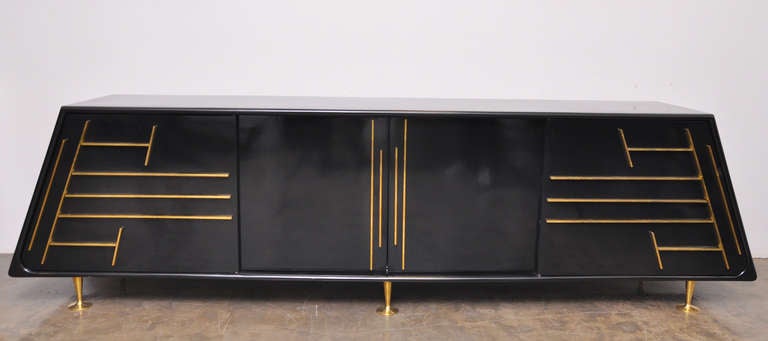 Rare Eugenio Escudero custom made Black Lacquered Pyramid Credenza.  
Extremely Hard to Find Mexican Mid Century Modern!
Mexico City, Circa 1950's.
Beautiful Angled Ends.
Mahogany with Bronze Accents and Sabots.