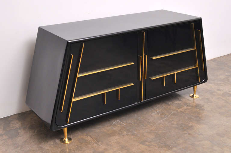 Custom Black Lacquered Pyramid Shape Petite Credenza by Eugenio Escudero.  
Extremely Hard to Find Mexican Mid Century Modern!
Mexico City, circa.1950's 
Lacquered Mahogany and Solid Bronze Accents and Trompet Sabots.
