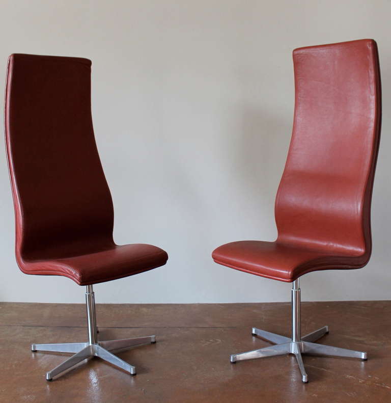 Pair of tall leather Oxford chairs by Arne Jacobsen.
By Fritz Hansen.
circa 1970s.