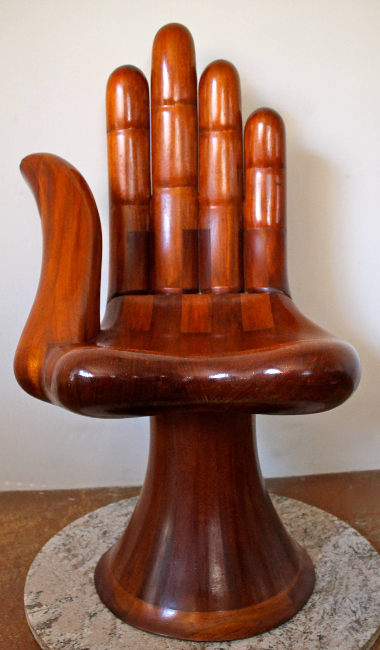 Iconic hand chair sculpture by Mexican Surrealist Pedro Friedeberg.
Carved in Mexico City, 1970.
Signed underside Pedro Friedeberg.
Chair comes with a certificate of authenticity handwritten from the artist.

Very hard to find an original 1970