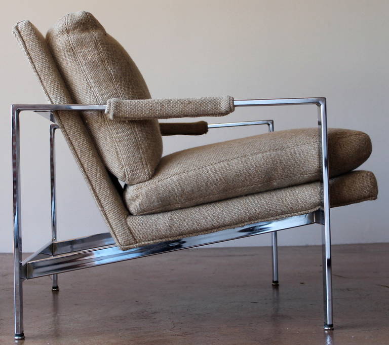 A pair of flat bar chrome cube lounge chairs by Milo Baughman for Thayer Coggin.
Original tweed upholstery with manufacture and shipping labels intact, circa 1976.
Chrome is in good to excellent condition and all original leg tabs are present.