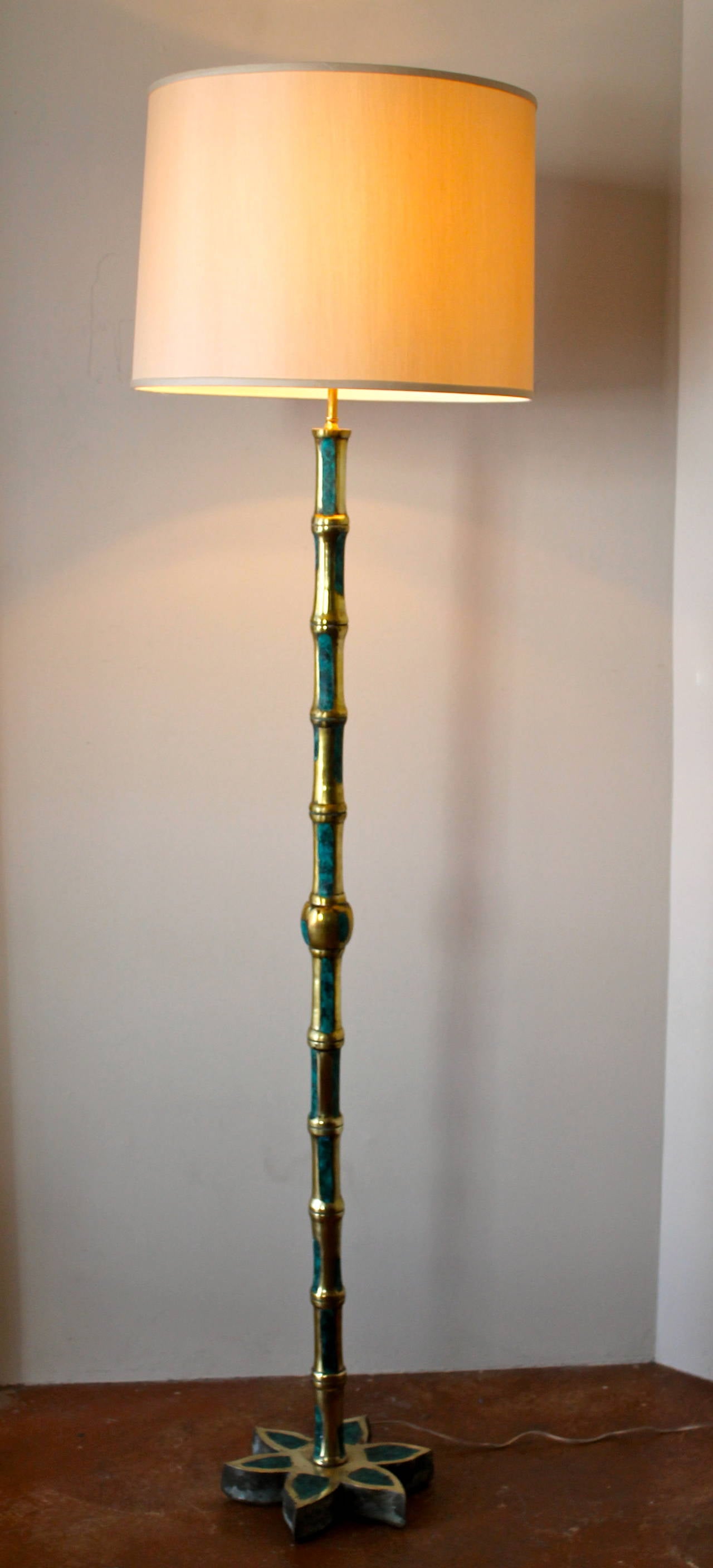 Beautiful and rare set of two solid cast brass bamboo with ceramic turquoise inlay floor lamps.
By Pepe Mendoza,
Mexico City, 1959.
Amazing flower shaped bases.
Each lamp is signed Pepe Mendoza, Mexico.
Completely restored and rewired.
Brand
